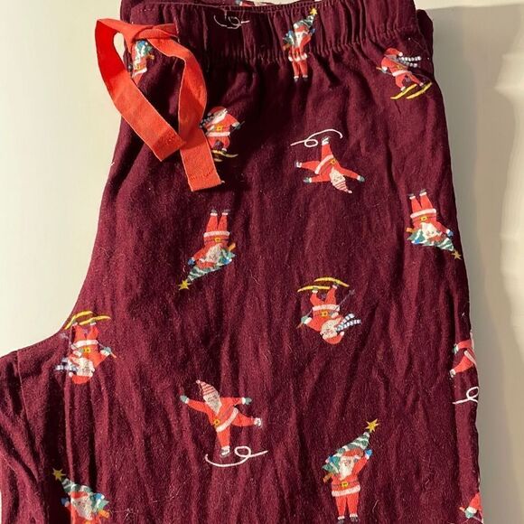 Old Navy Christmas Pajama Pants Santa Skiing Skating woman’s Medium - Picture 1 of 3